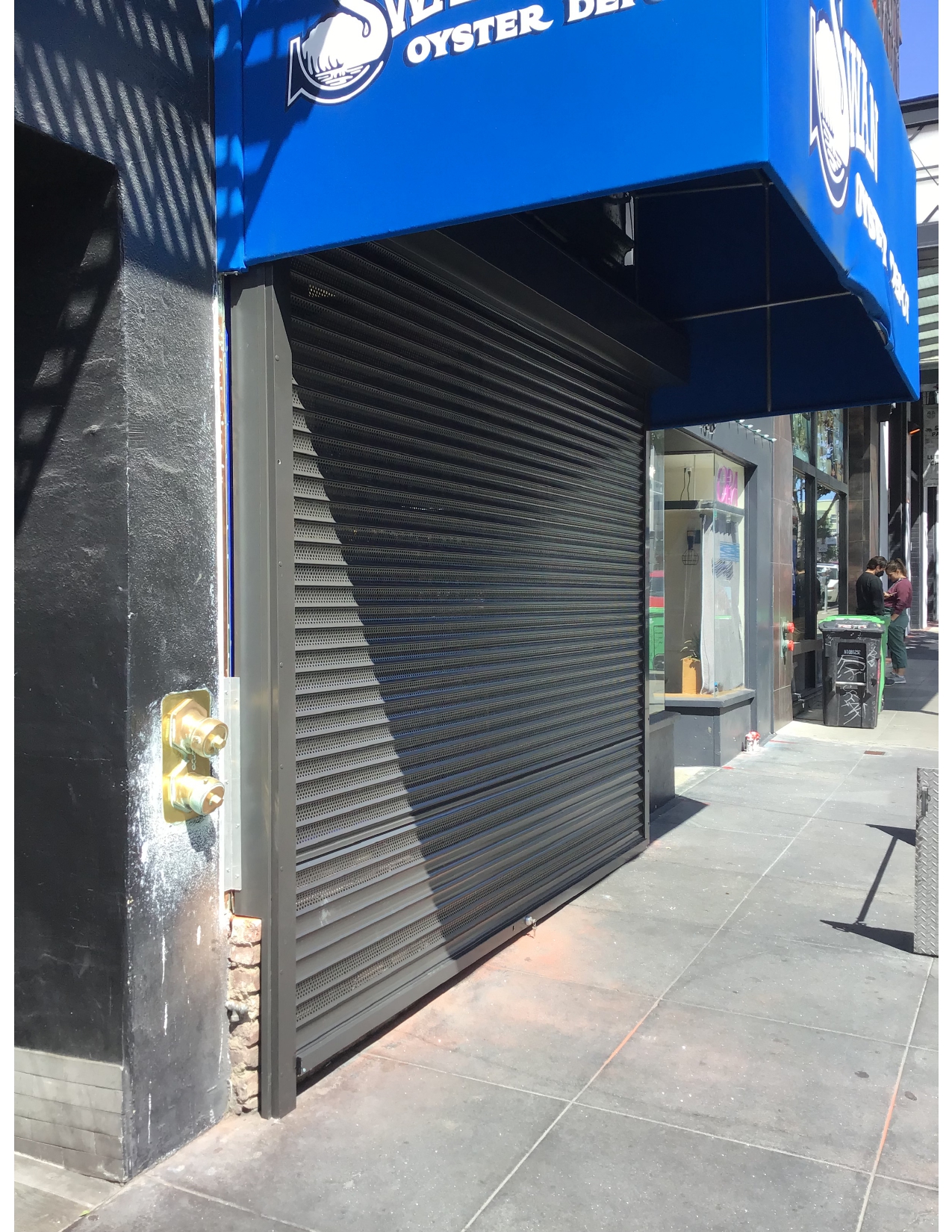 Perforated security shutters installed at a San Francisco, California commercial property