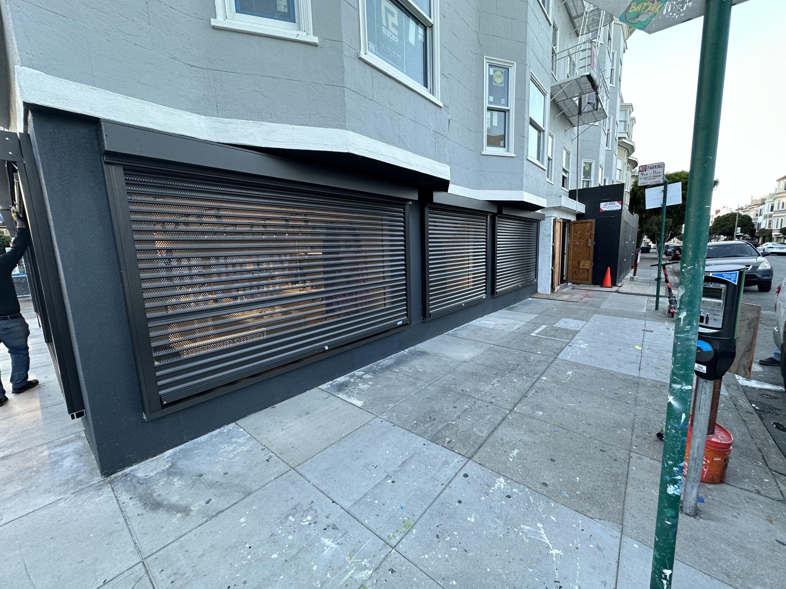 Commercial perforated security shutters installed on a San Francisco, California property