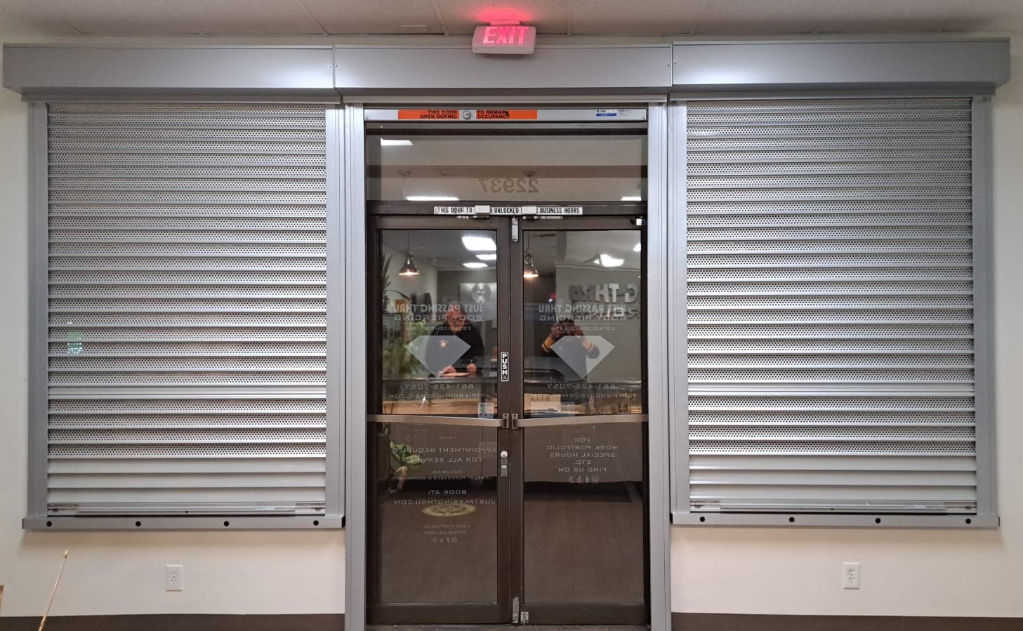 Interior perforated rolling security shutters at a Santa Clarita, California commercial property