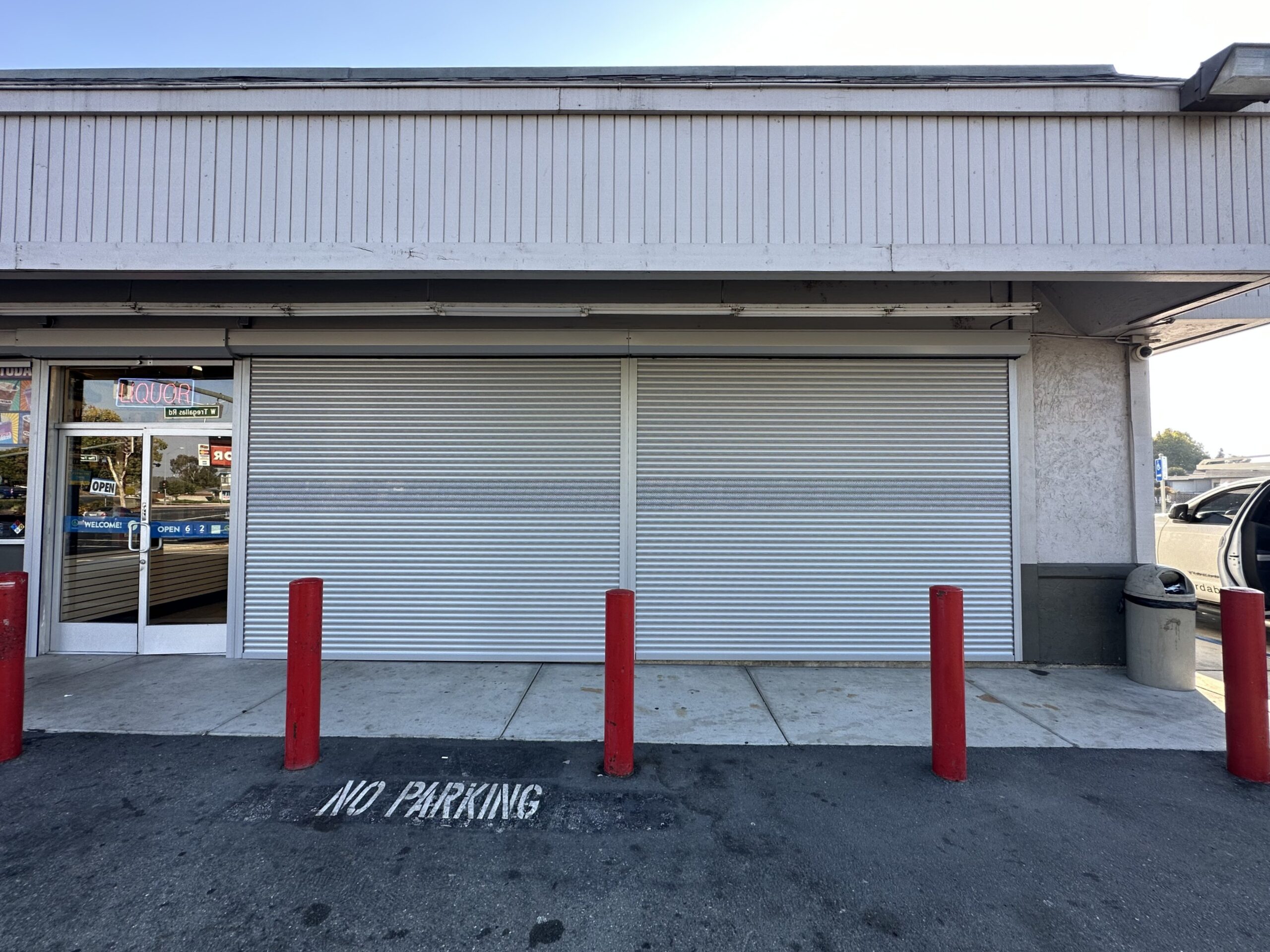 Exterior rolling security shutters installed at an Antioch, California commercial property