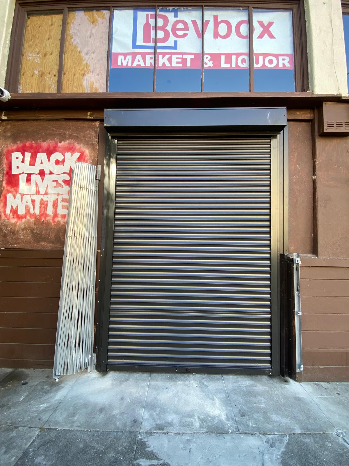 Exterior rolling security shutters installed at an Oakland, California commercial property