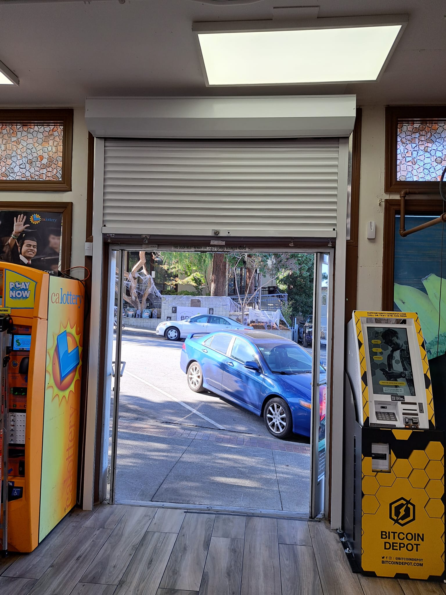 Interior rolling security shutters installed at a Brisbane, California commercial property