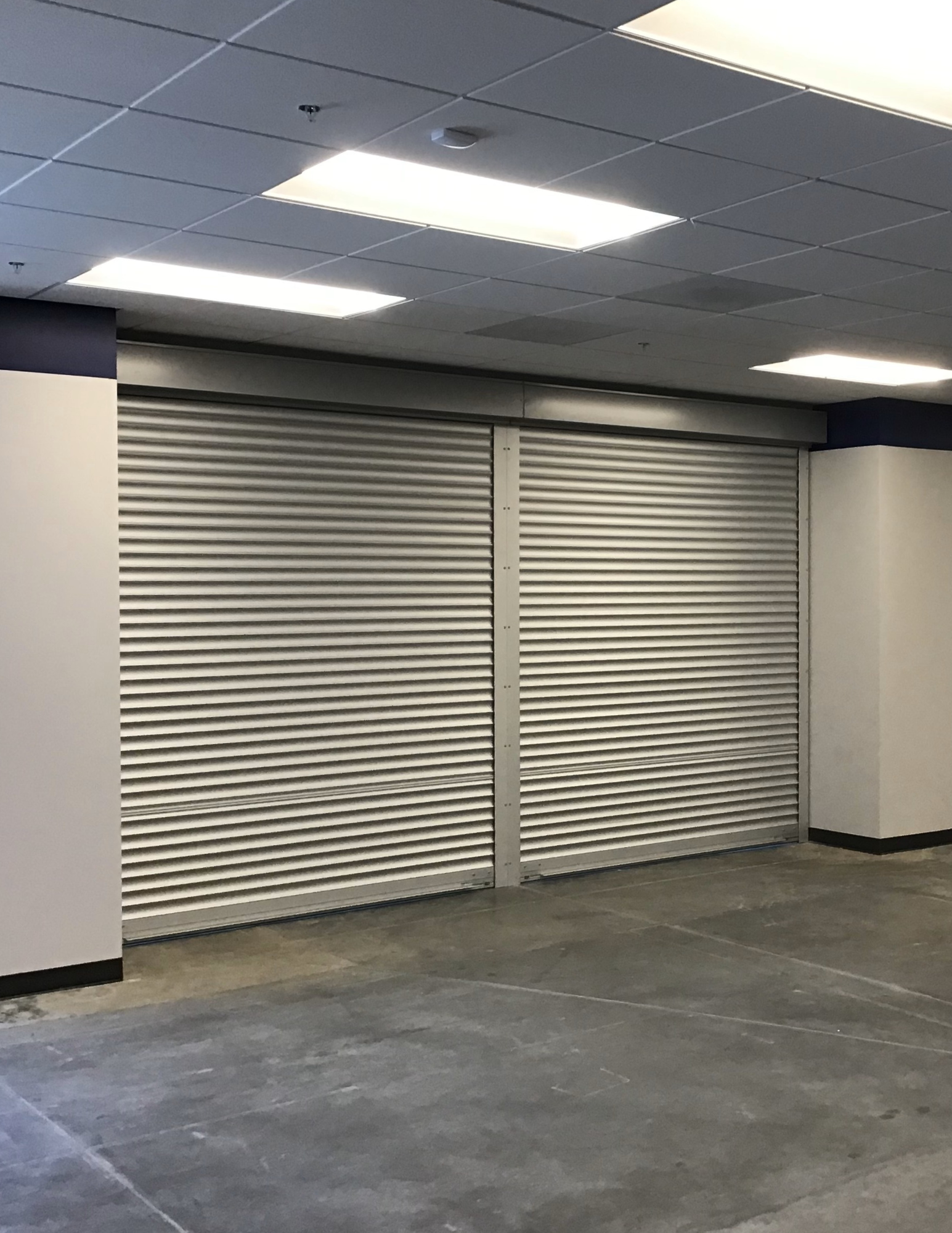 Rolling security shutters installed inside a Concord, California business