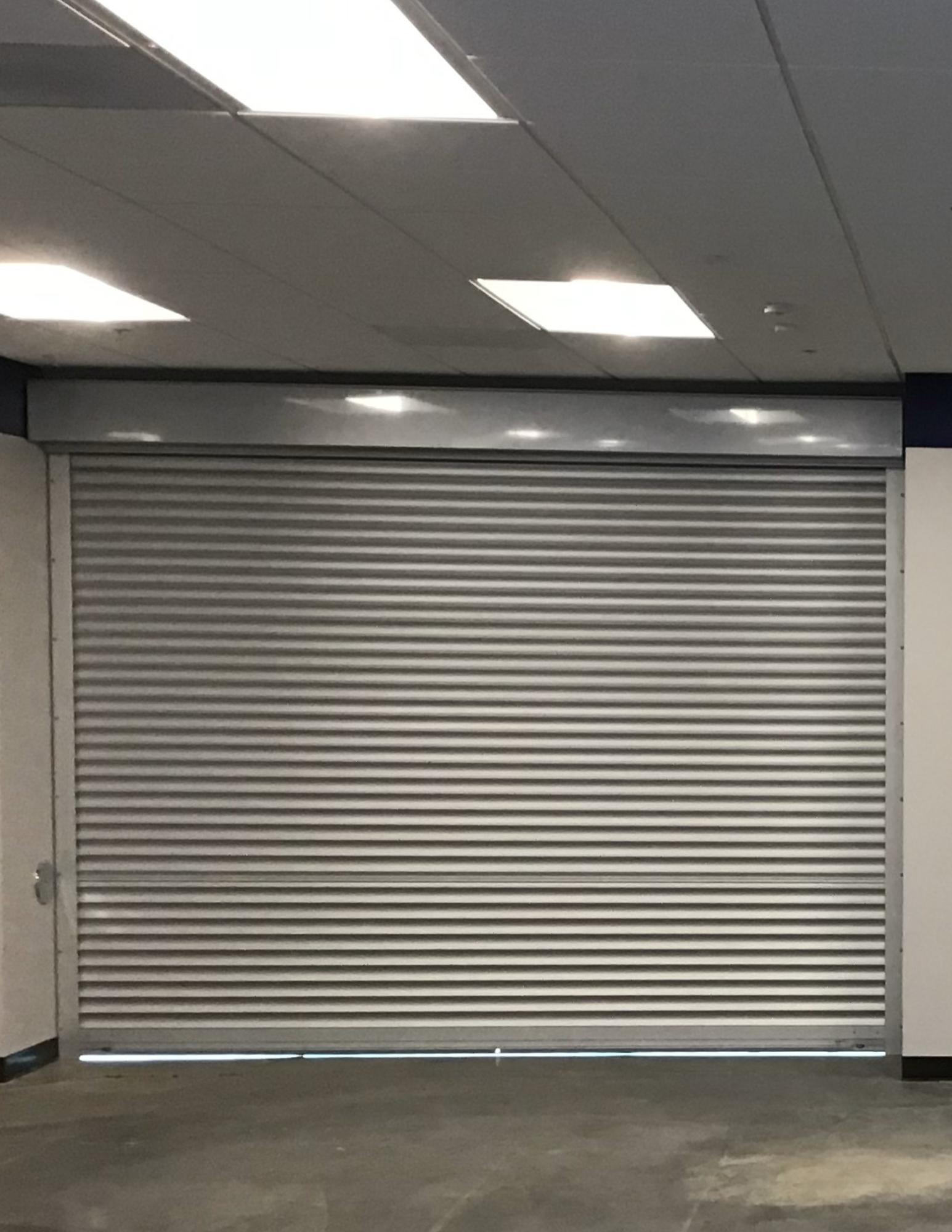 Interior rolling shutters installed at a Concord, California commercial property