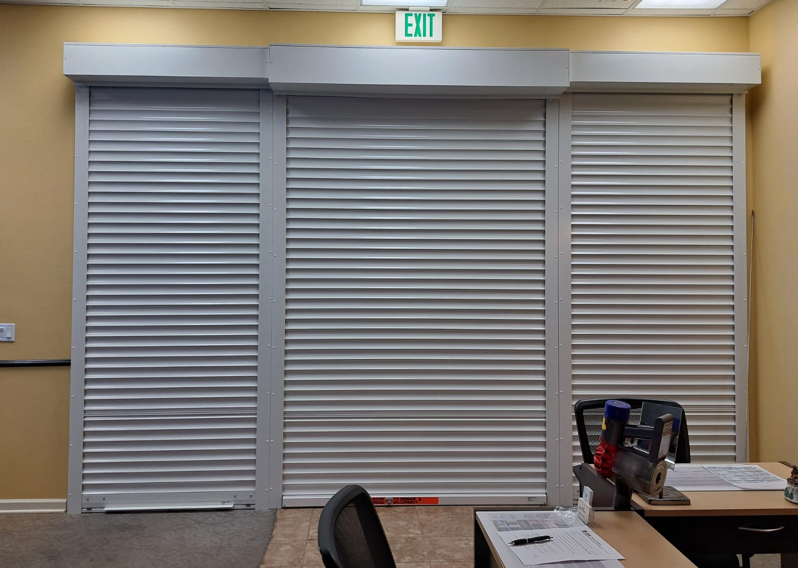 Interior rolling security shutters installed at a Tracy, California commercial property